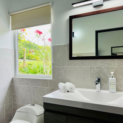 FINCA BELLA VILLAGE BAÑO TWIN ROOM